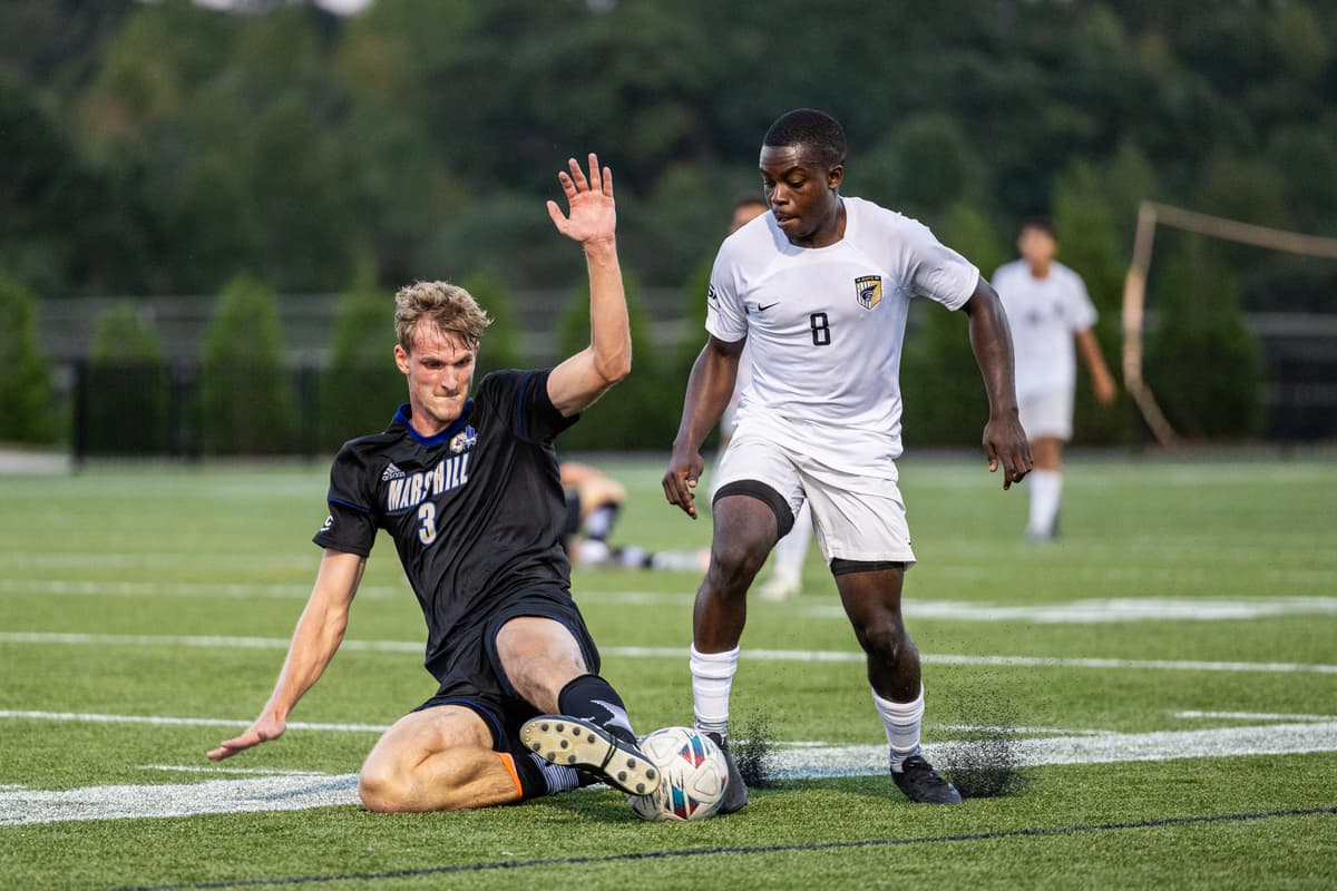 Wesley playing soccer at Anderson University